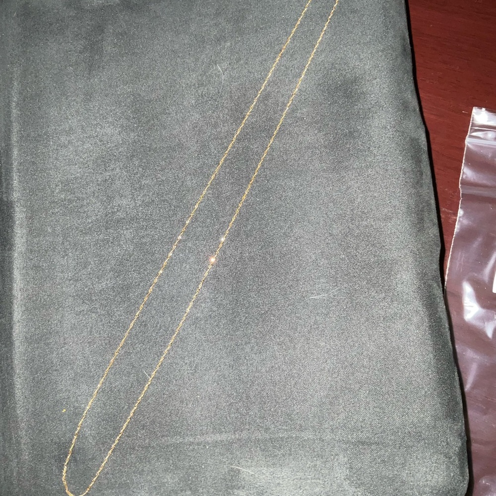 10KT Singapore lightweight chain 24”.